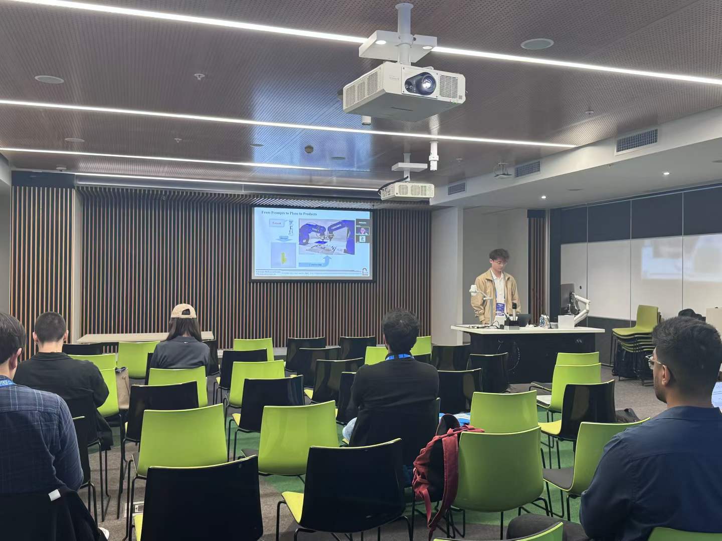 Junhao Wu chairing a session at the FM4RoboPlan Workshop